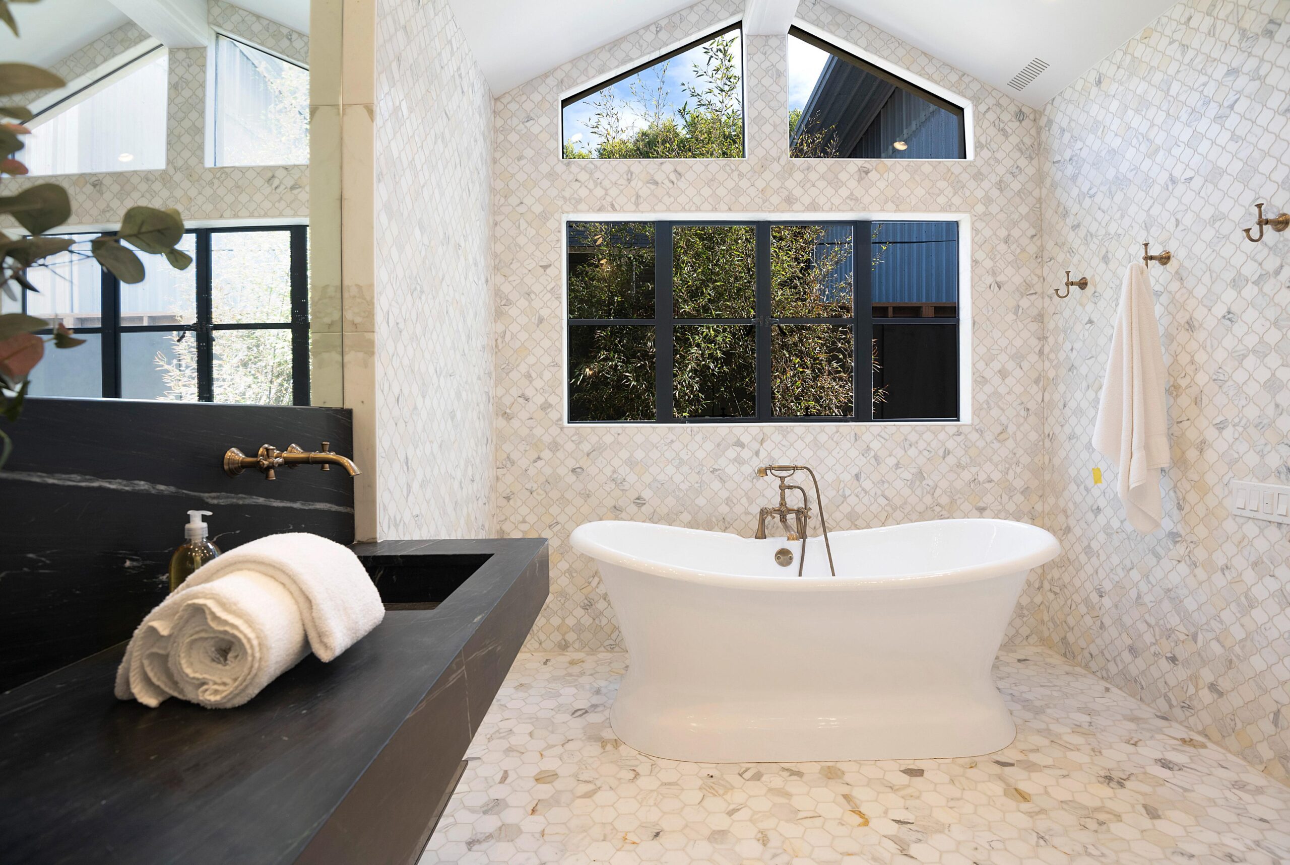 Luxurious stand alone tub featured in modern bathroom design