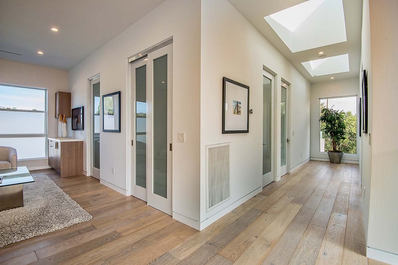 minimalist style upstairs hallway and living space in modern California home