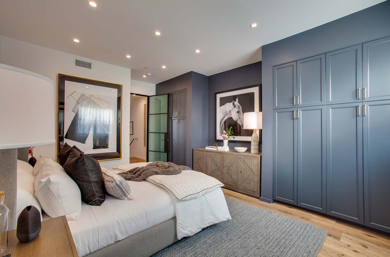 Spacious modern bedroom with dual closets